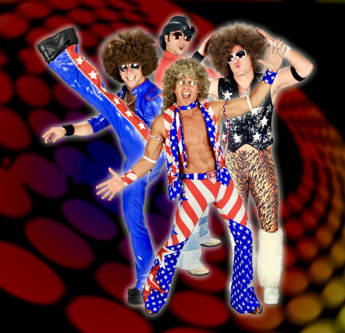 An image of four men in band outfits